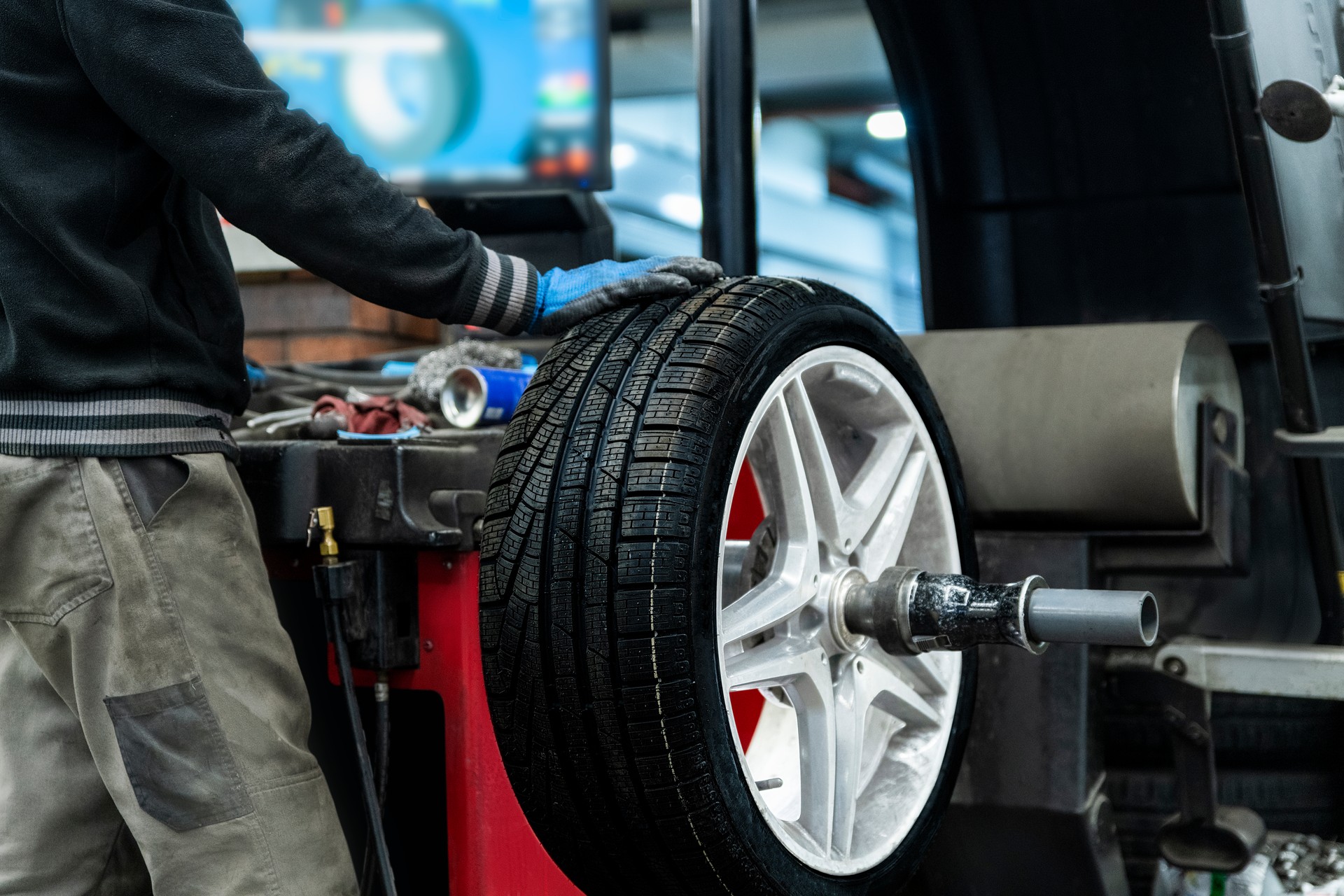 Mechanic Man Working on Balancing Machine